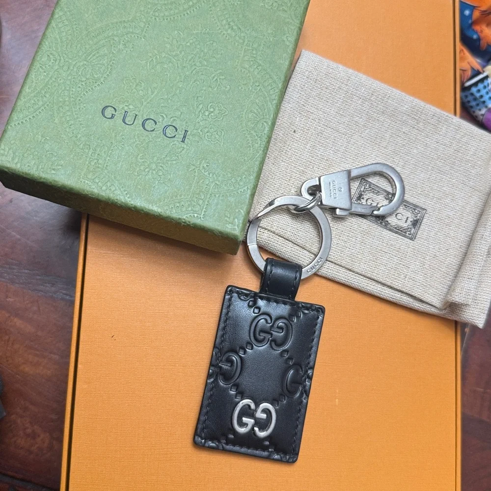 Brand new with box and dustbag Gucci Black Embossed Leather Key Holder keychain